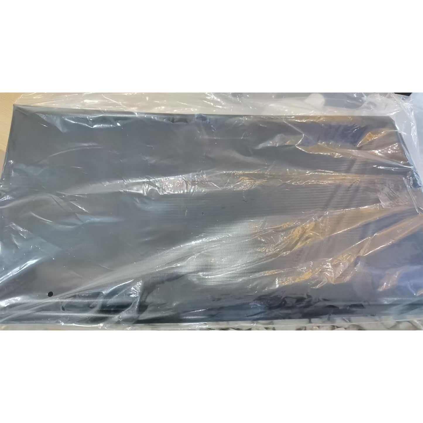 Black PVC pond liner packed in plastic bag, long flat roll