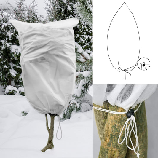 White protective plant cover with drawstring cord, covering a tree trunk