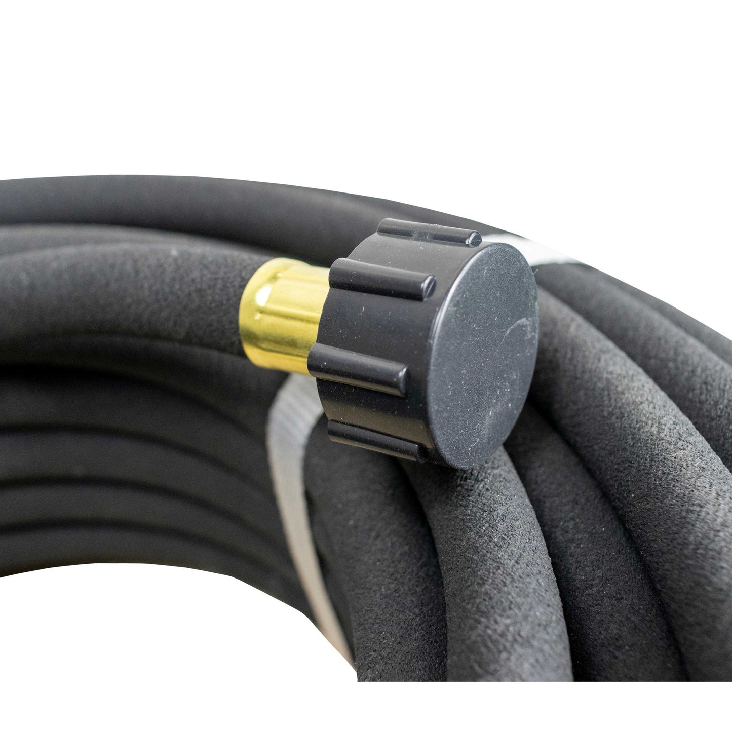 Coiled black porous soaker hose with water-connection fitting at one end