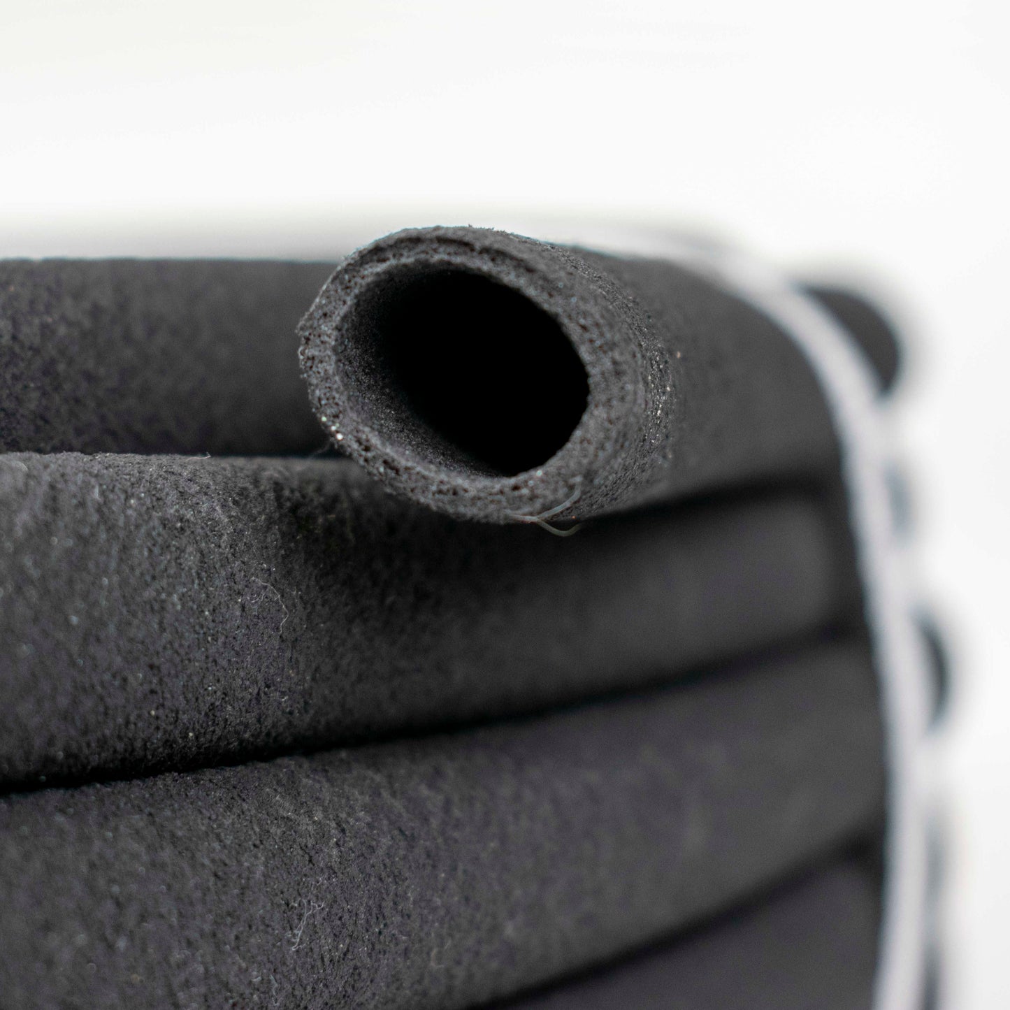 Porous pipe insert, dark porous tube end with hollow opening