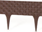 Brown plastic lawn edging with rattan-style texture and pointed stakes