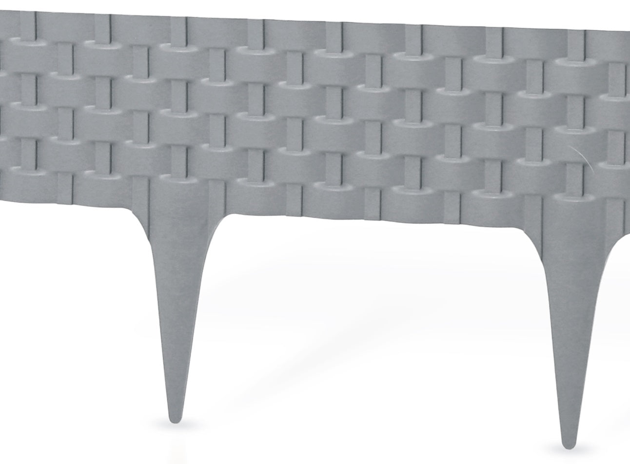 Gray plastic lawn edging with rattan-style pattern and pointed stakes