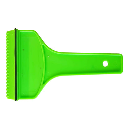 Close-up: green scraper blade with serrated edge and dark rubber strip