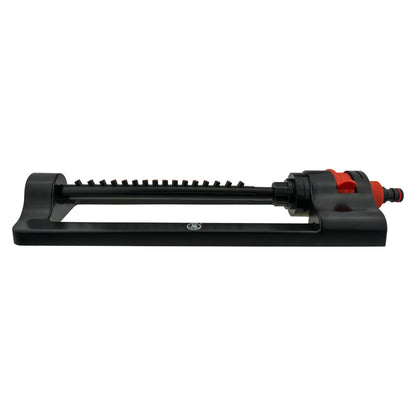 Black oscillating sprinkler with long spray bar and red dial at the outlet