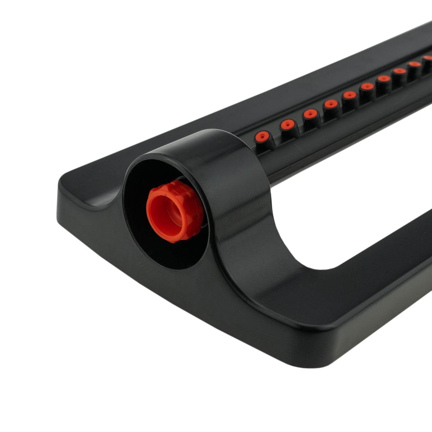 Sprinkler end cap with orange insert and row of red nozzle ports