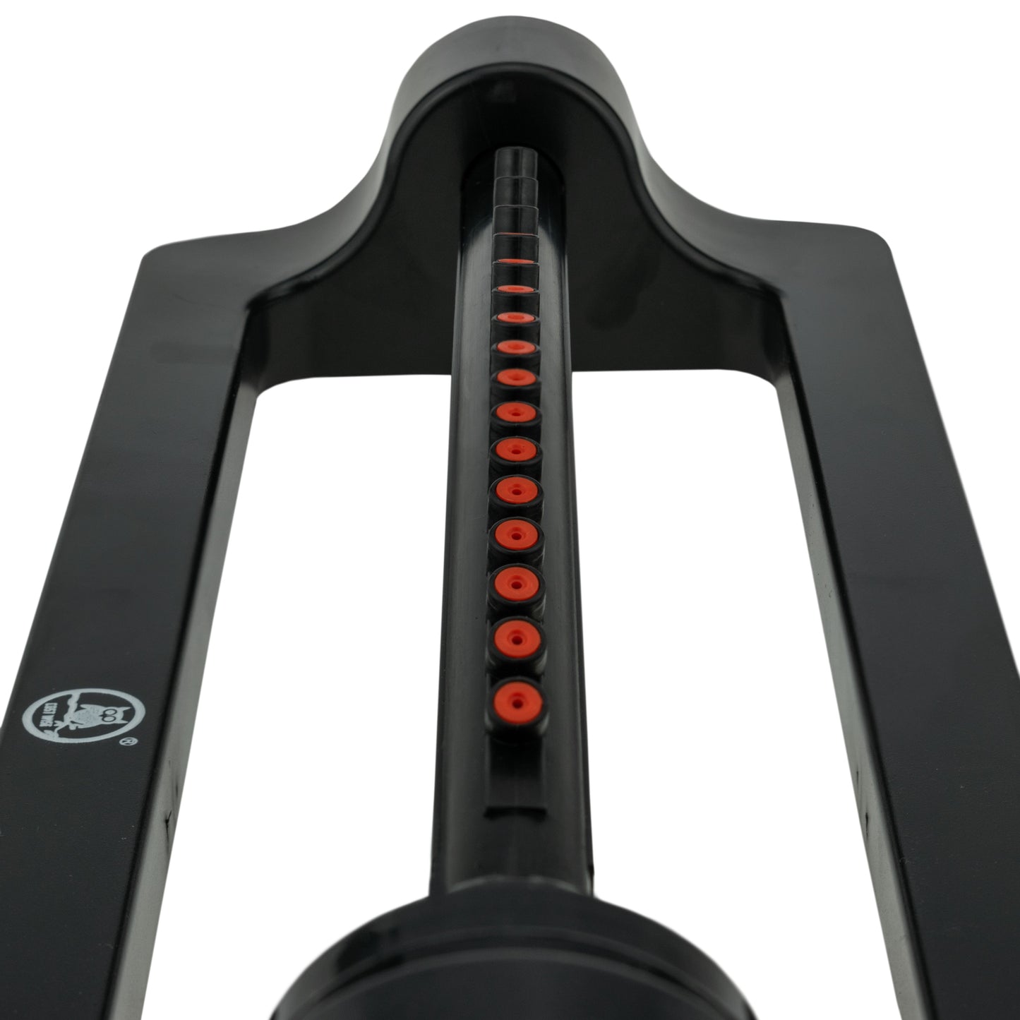 Center tower with red nozzle ring inside black oscillating frame