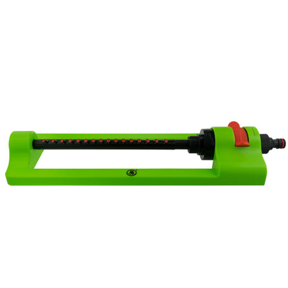 Oscillating sprinkler with green base, black tube, red switch, and hose fitting