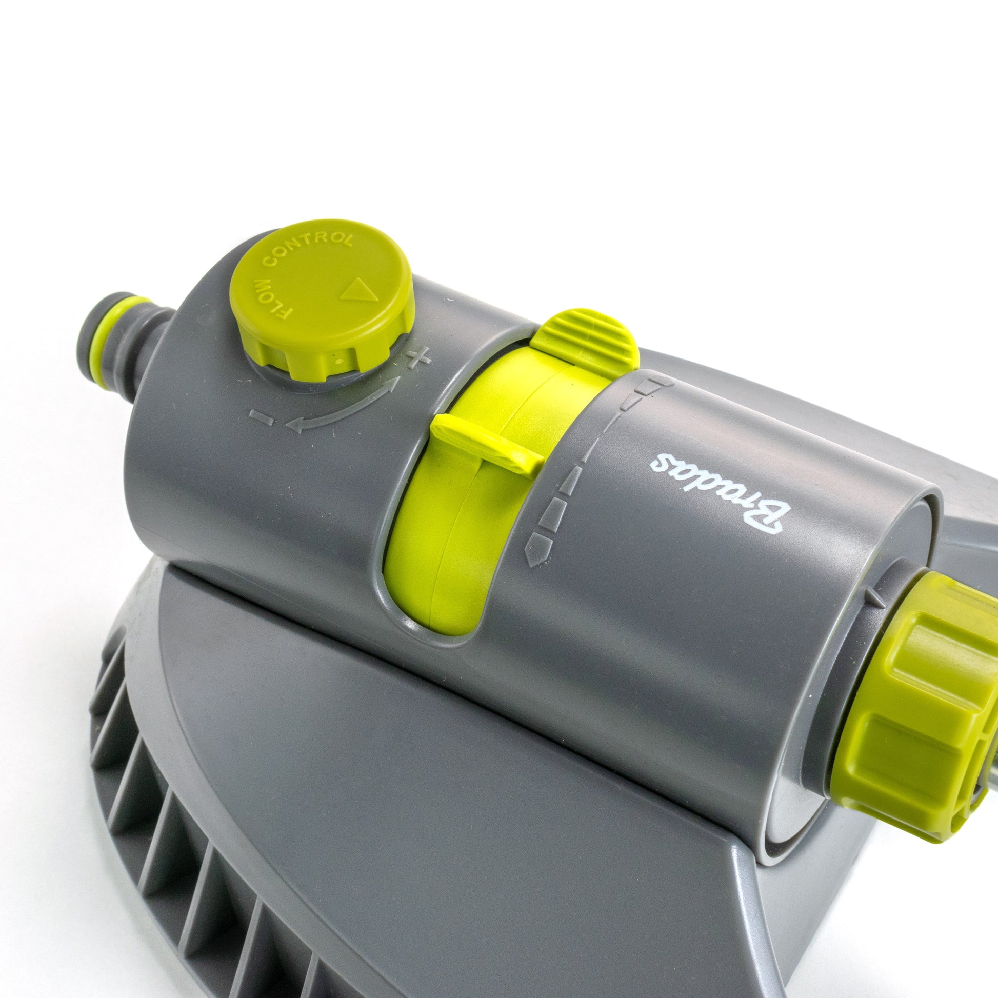 Sprinkler with lime control knob, gray housing, and metal bar extending from base