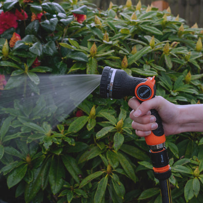 Water sprayer gun with misty fan stream; orange-and-black handle