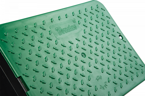 Standard valve box 51x38cm close-up of green perforated top surface