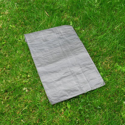 Gray tarpaulin 4m x 5m, partially folded on grass