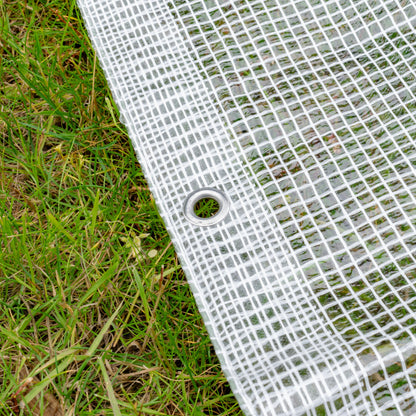 Clear tarpaulin edge with round metal grommet eyelet on reinforced grid