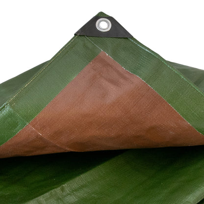 Corner of green tarpaulin with metal eyelet and brown backing panel