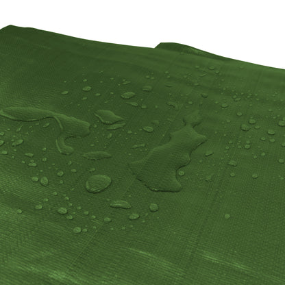 Green tarpaulin surface with water droplets, textured woven fabric