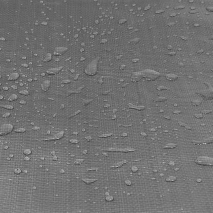 Grey tarpaulin surface close-up with water droplets on textured weave