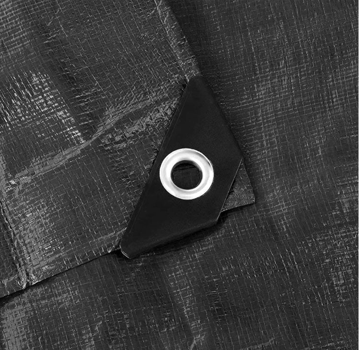 Black tarp with metal grommet and corner reinforcement tab