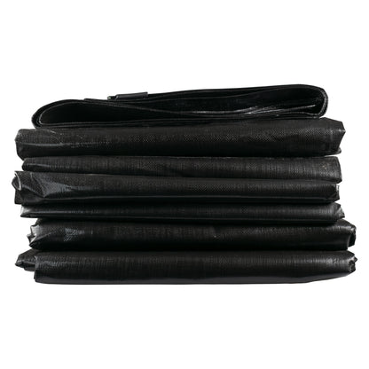 Stack of black tarpaulin sheets with layered folds and rolled edge