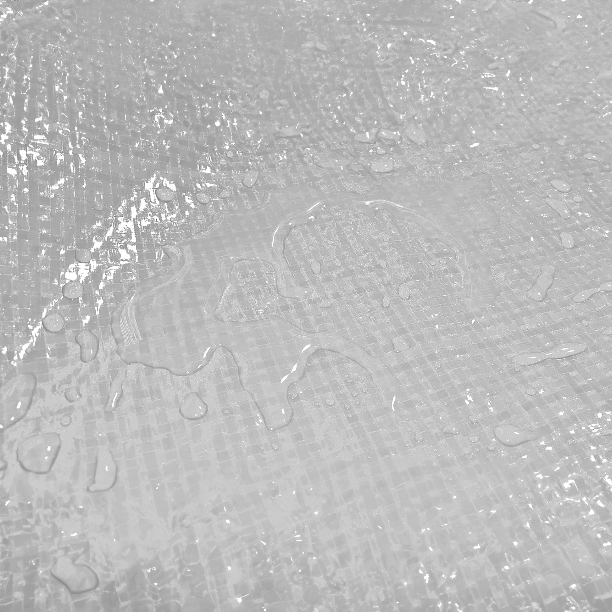 White tarpaulin fabric close-up with textured surface