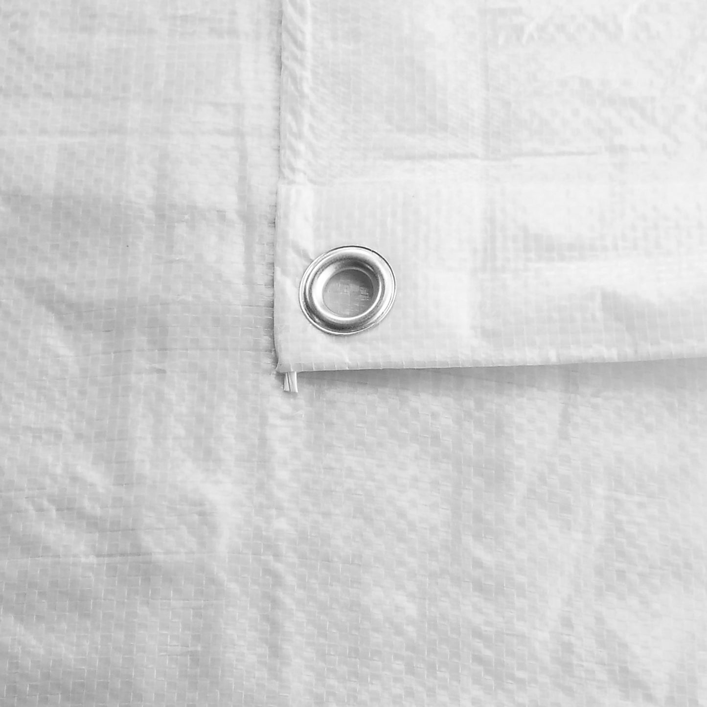 White tarpaulin edge with metal grommet, 90 GSM, M-grade strength
