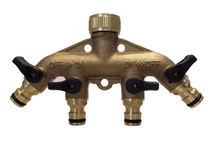 Front view of brass 4-way manifold with black valve levers and outlet ports