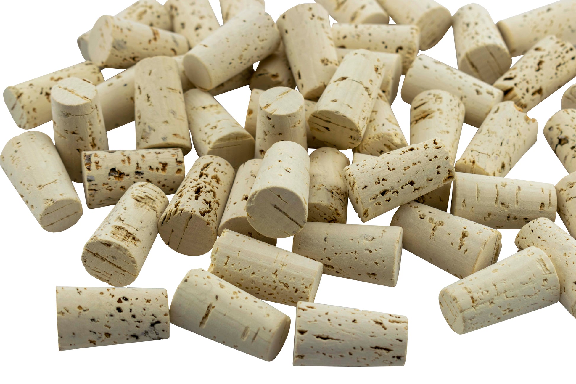 Bulk tapered cork pieces, off-white with scattered brown speckles