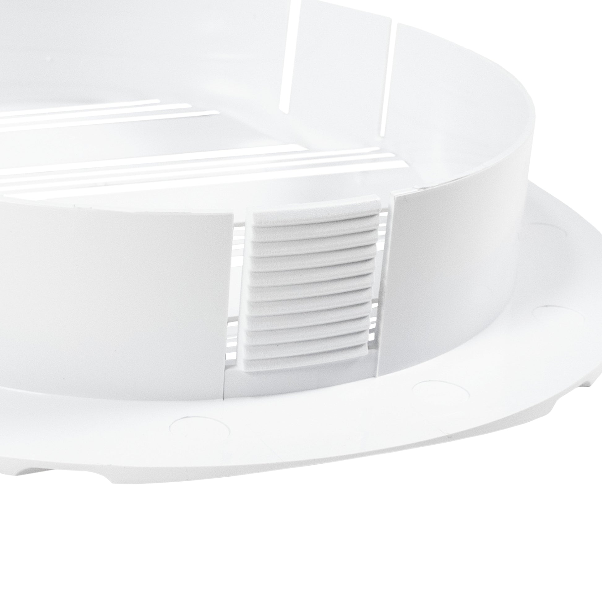 White external vent housing with angled face and louvered air slats on duct