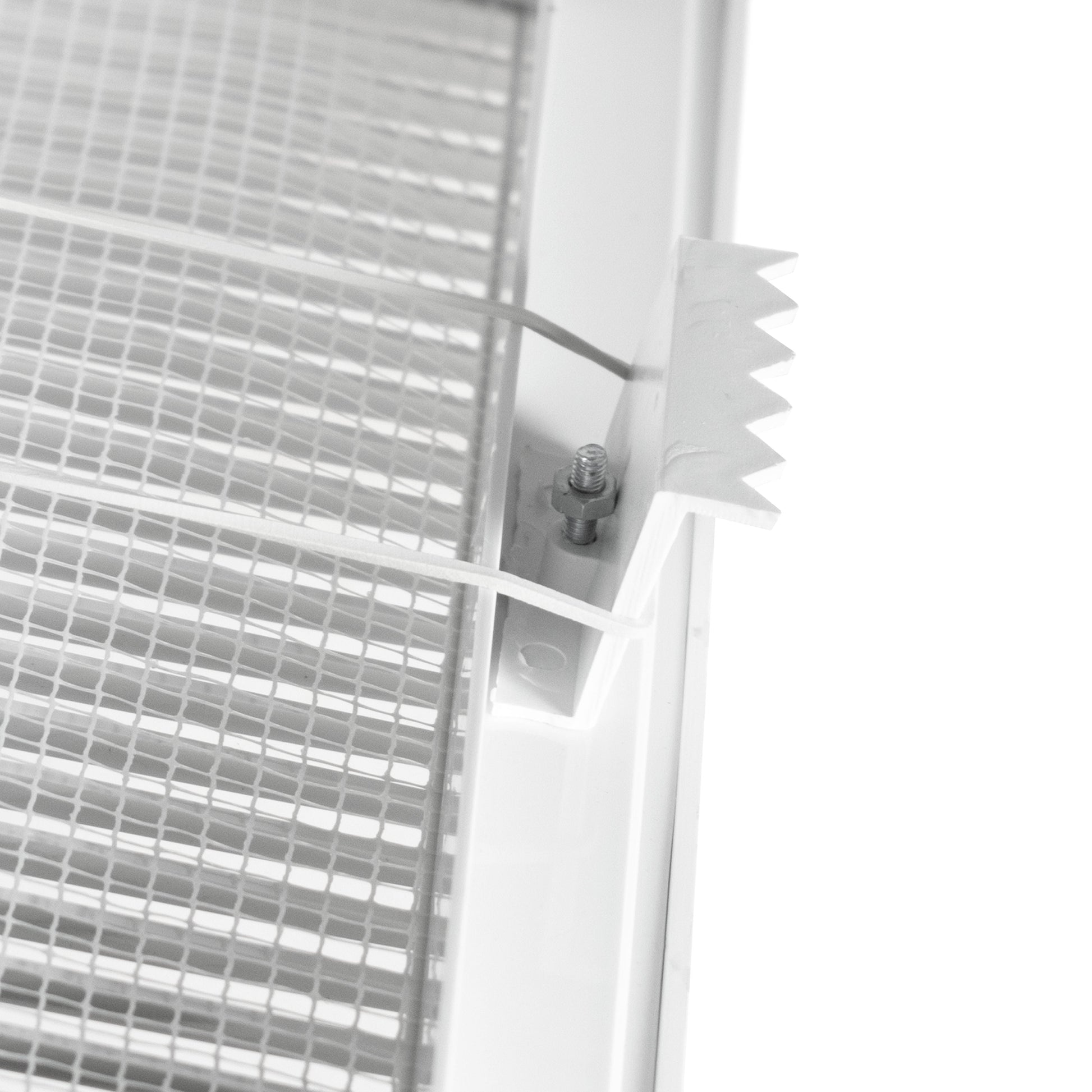 Close-up of fly mesh and fixing screws on the white vent frame