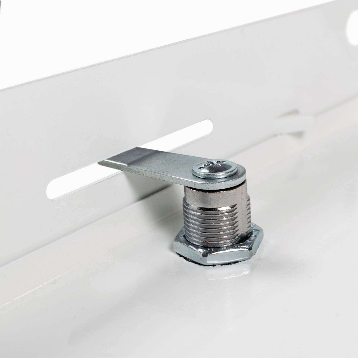White metal access panel door lock, close-up of latch bracket and threaded stud