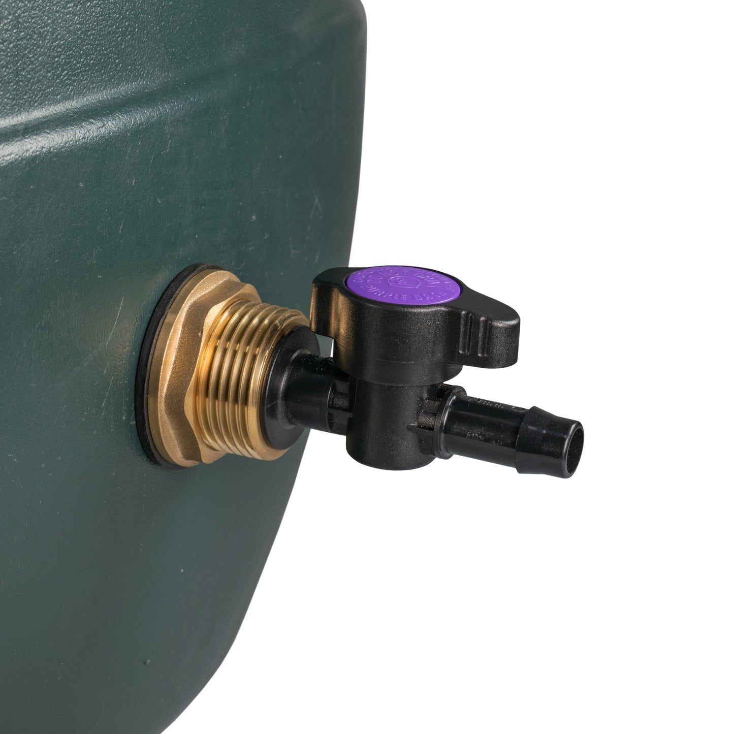 Close-up of brass tank inlet with black irrigation valve and purple handle