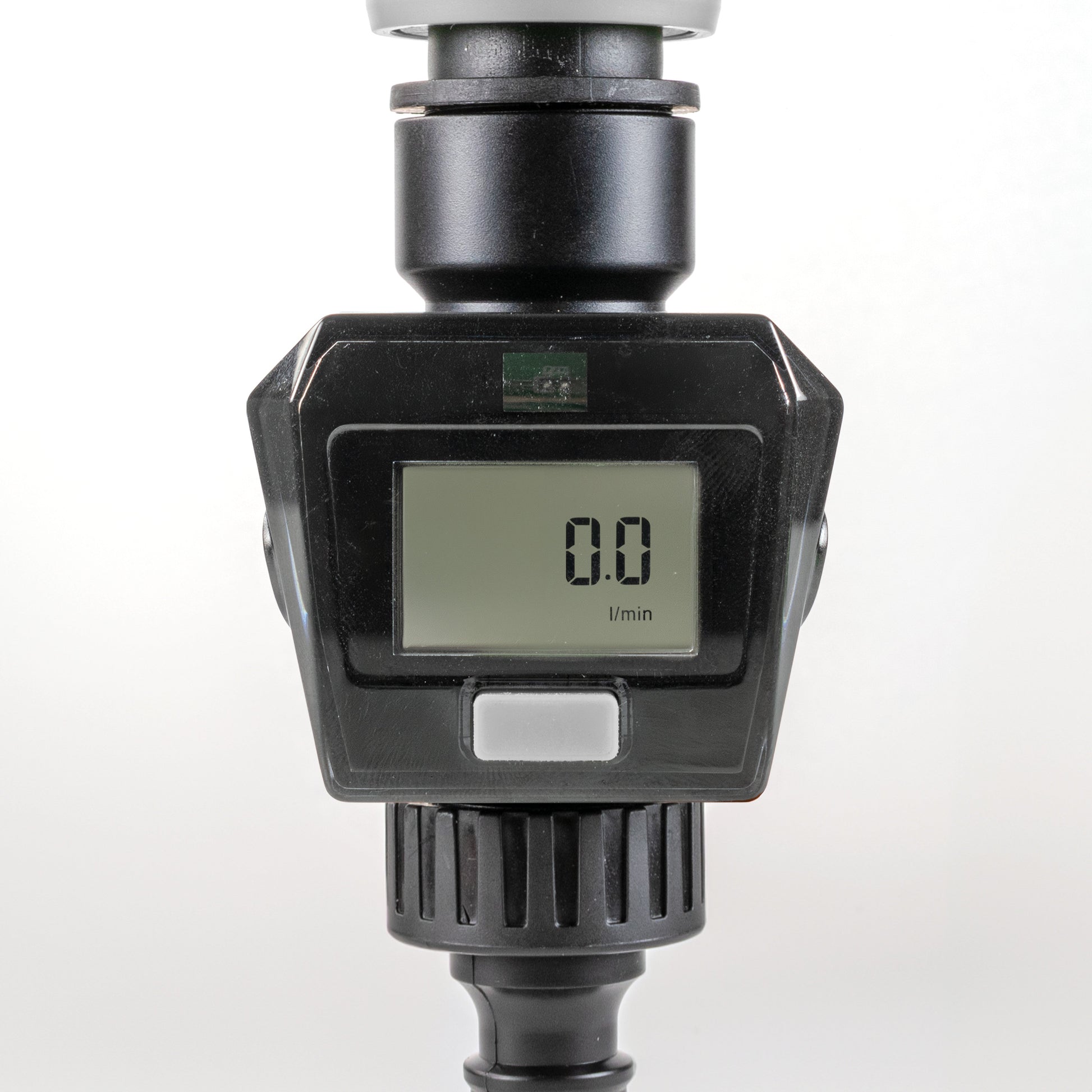 Water Flow Meter Gray, LCD display shows 0.8 with “l/min”, dark device body
