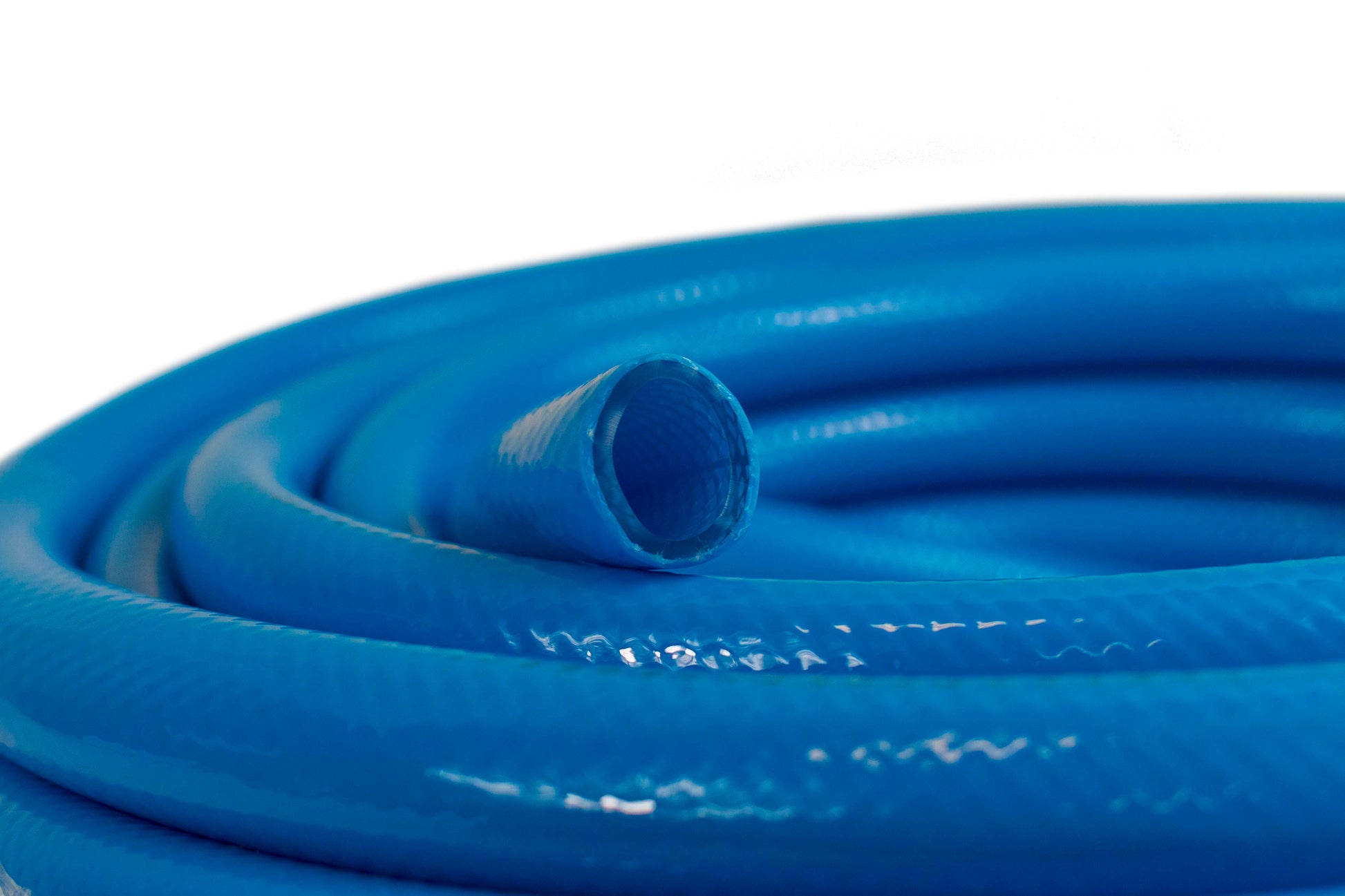 Blue 1/2" hose pipe end, close-up of the inner tube opening