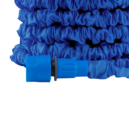Rolled blue expanding garden hose with ribbed gray-black insert near connector