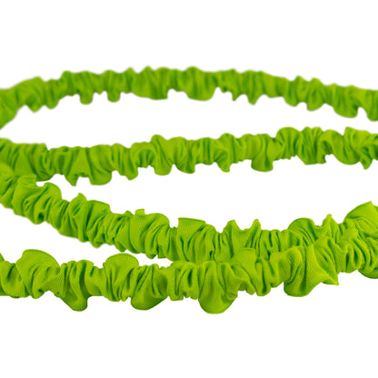 Close-up of lime expanding garden hose loops
