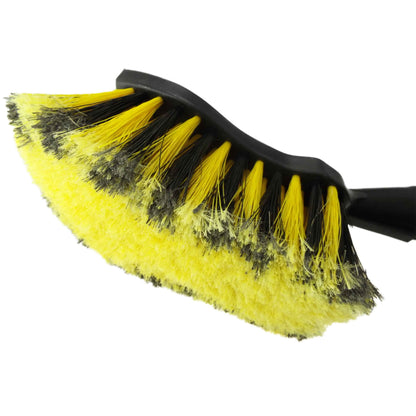 Curved cleaning brush head with dense yellow and black bristles