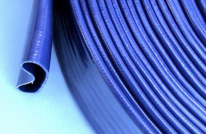 Blue PVC lay flat hose surface detail with parallel ridges and open end