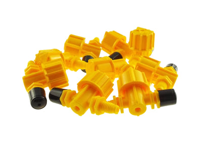 Assorted yellow spray heads with black nozzle tips and threaded fittings