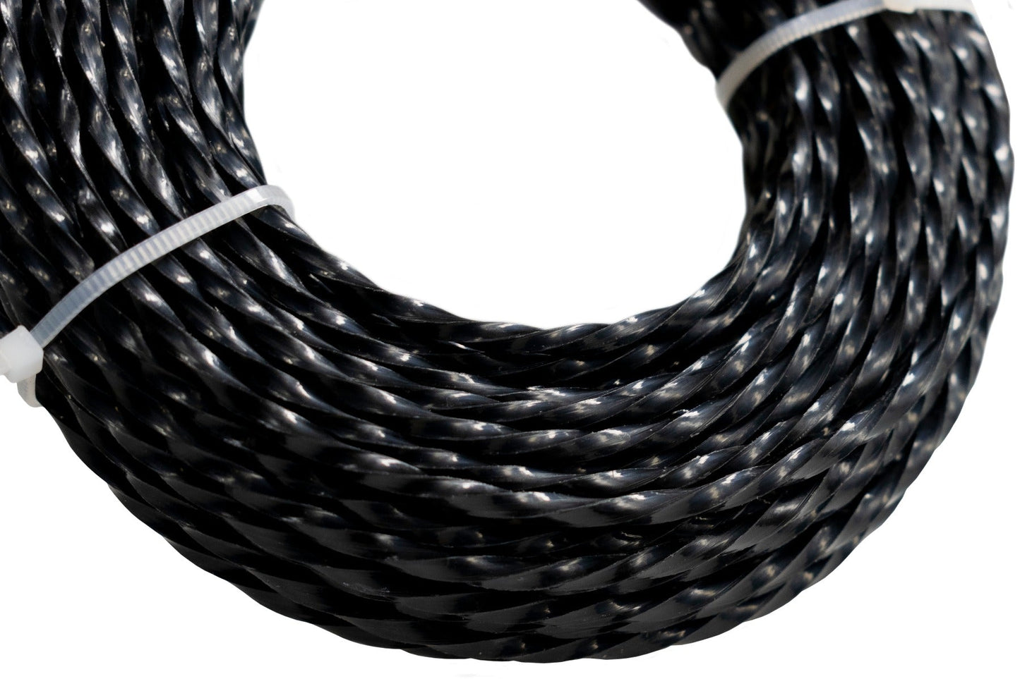 Close-up of black twisted strimmer line coils, 3mm