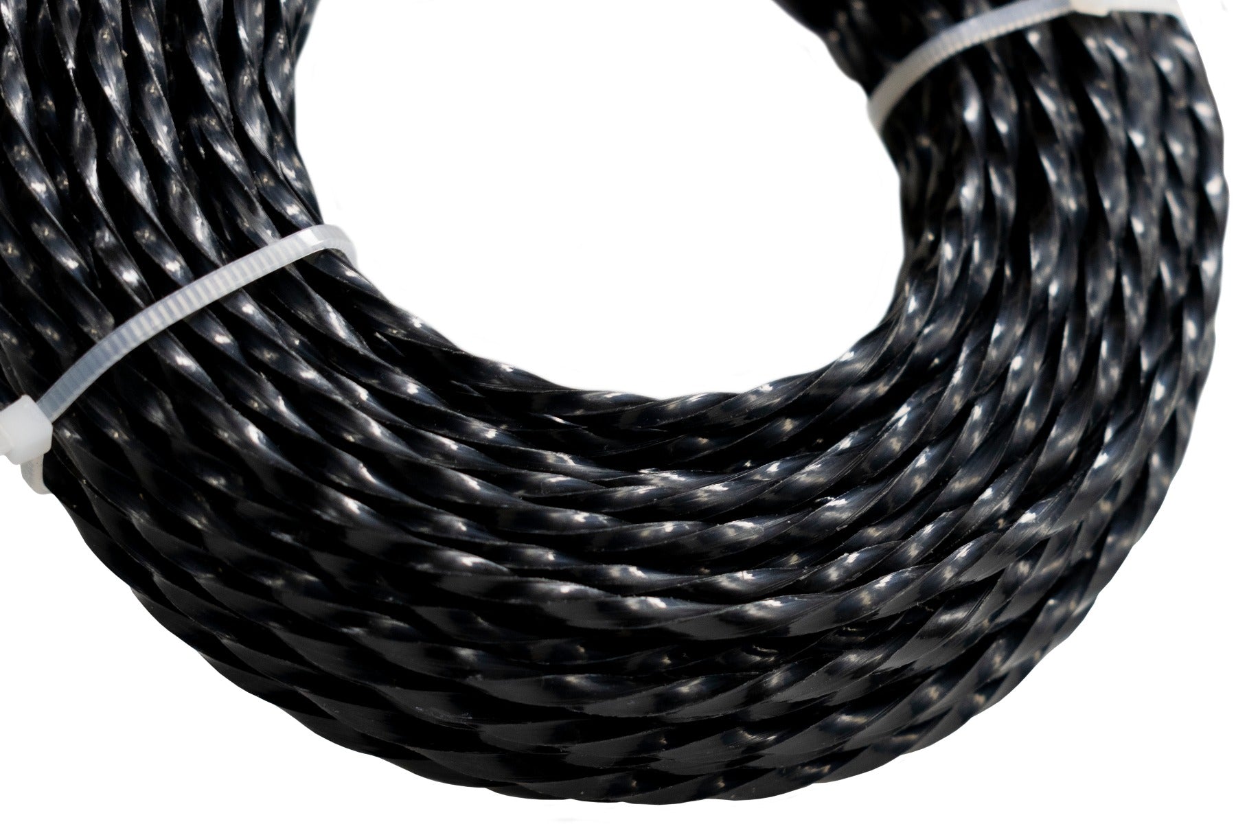 Close-up of black twisted strimmer line coils, 3mm