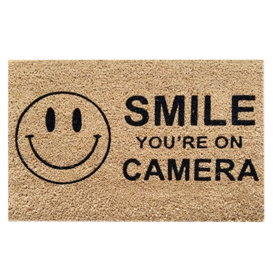 Doormat 60cm x 40cm with “SMILE YOU’RE ON CAMERA” text and smiley icon