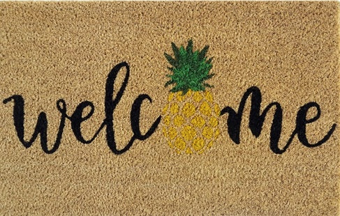 Beige coir doormat with 'Welcome' text and pineapple graphic