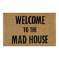 Doormat 60x40cm 'Welcome To The Mad House' with bold black text