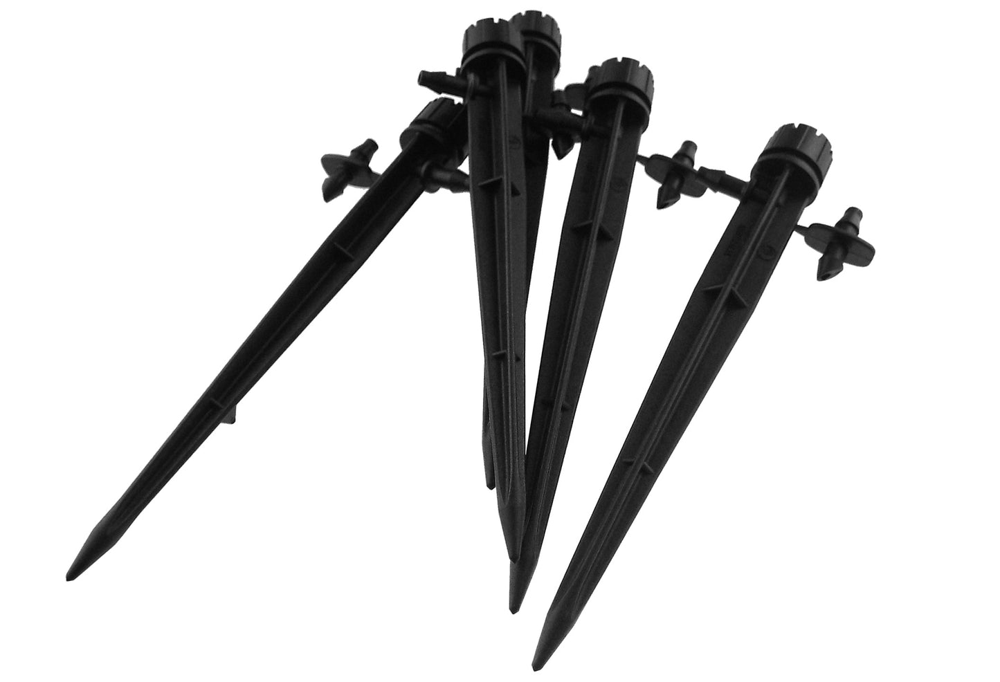 Four-way 360° inline sprinkler spikes connected to central manifold