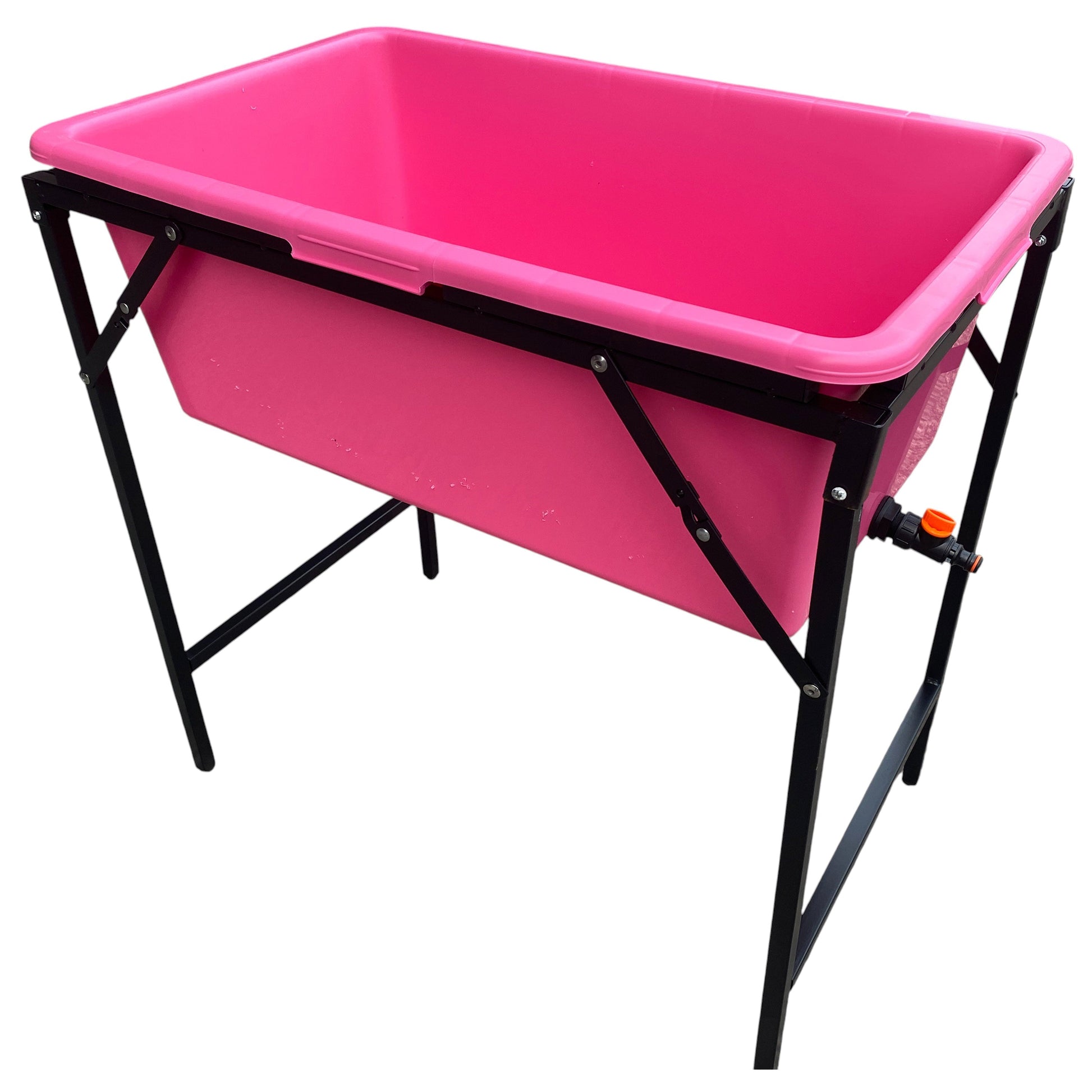 Pink dog bath with drain valve and black metal stand, rectangular tub shape