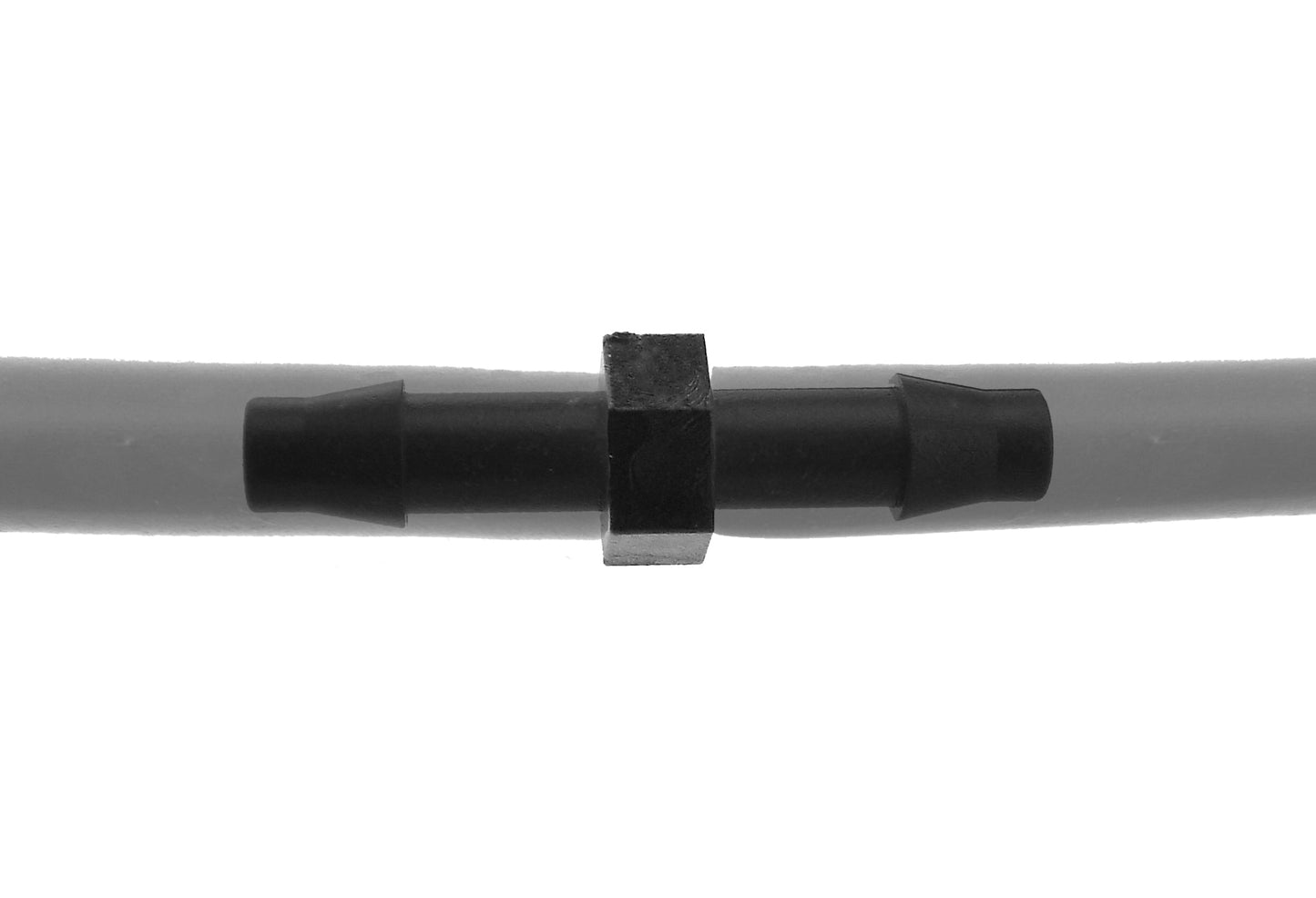 Close-up view of black 4.5mm barb micro joiner connector with square locking area