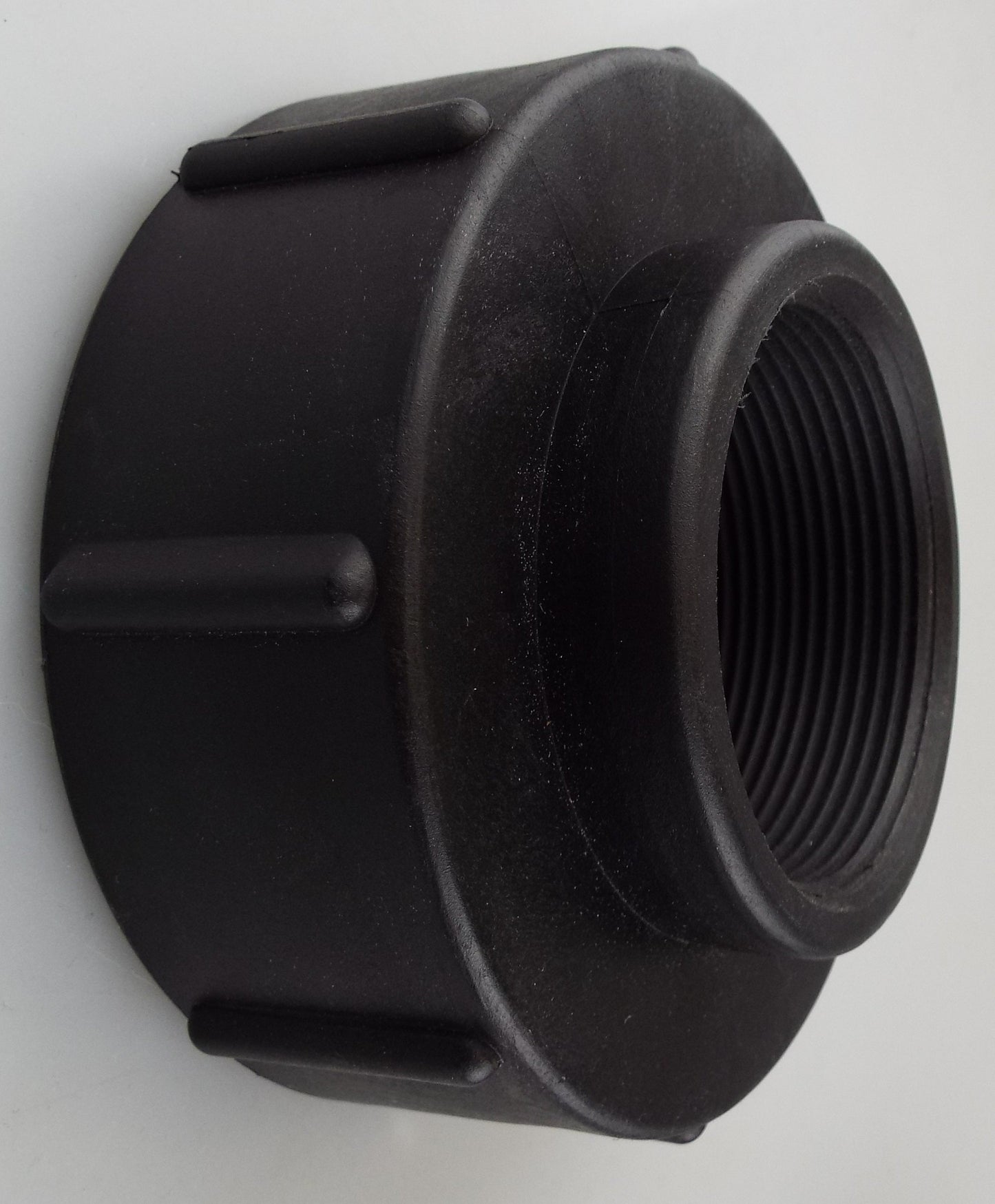 Black adapter close-up with external S100X8 coarse thread and locking lugs