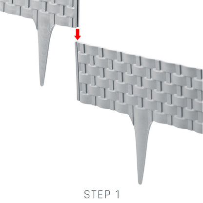 Grey lawn edging interlock close-up, pointed stakes and clasped section edge