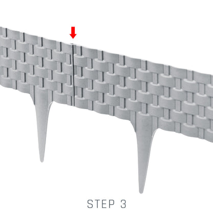 Gray rattan-effect lawn edging interlock area and pointed stakes (step 3)