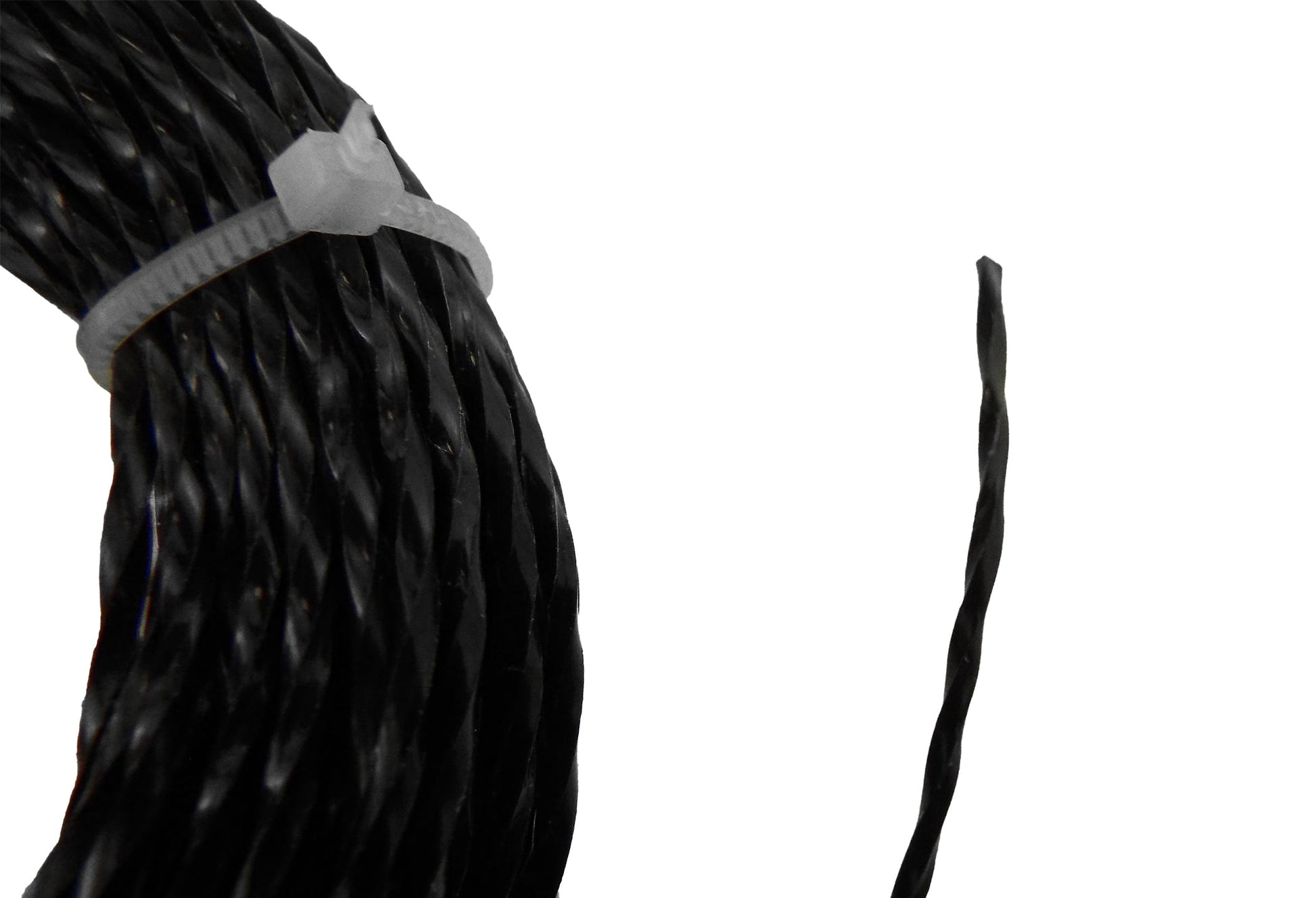 Black twisted strimmer line strand, close-up end section