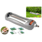 Compact oscillating sprinkler, gray body with orange control knob and spray ports
