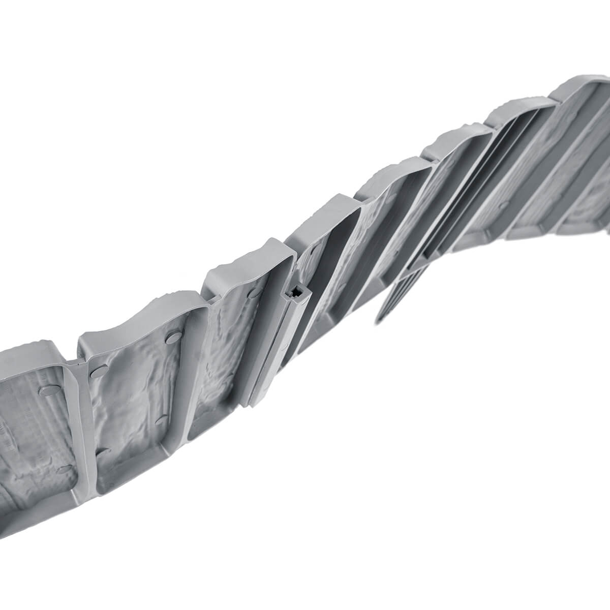 Close-up of gray wood-effect plastic edging interlocking panel sections